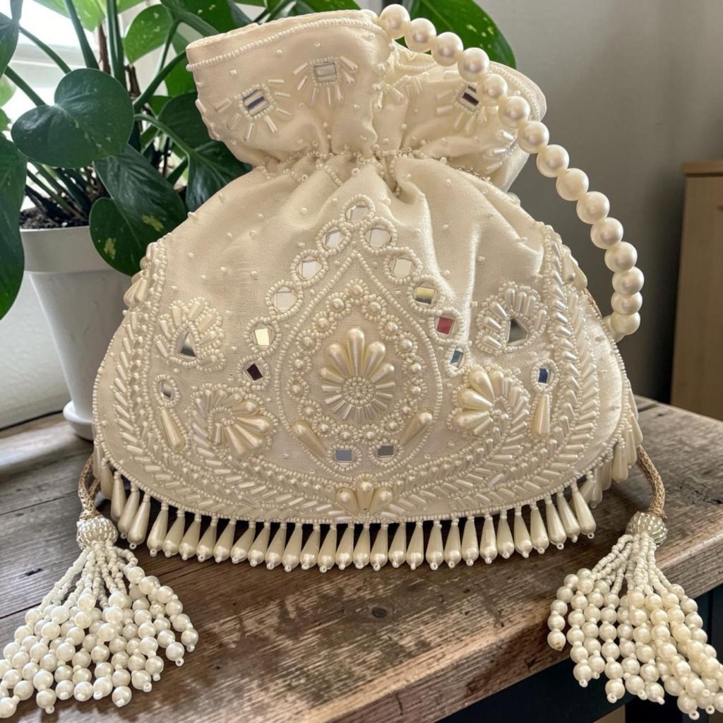 Ivory pearl and mirror potli